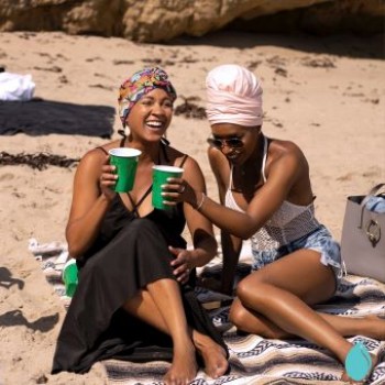 Women At The Beach Wearing Different Styles And Colors Of AQUA Waterproof Turbans And Headwraps